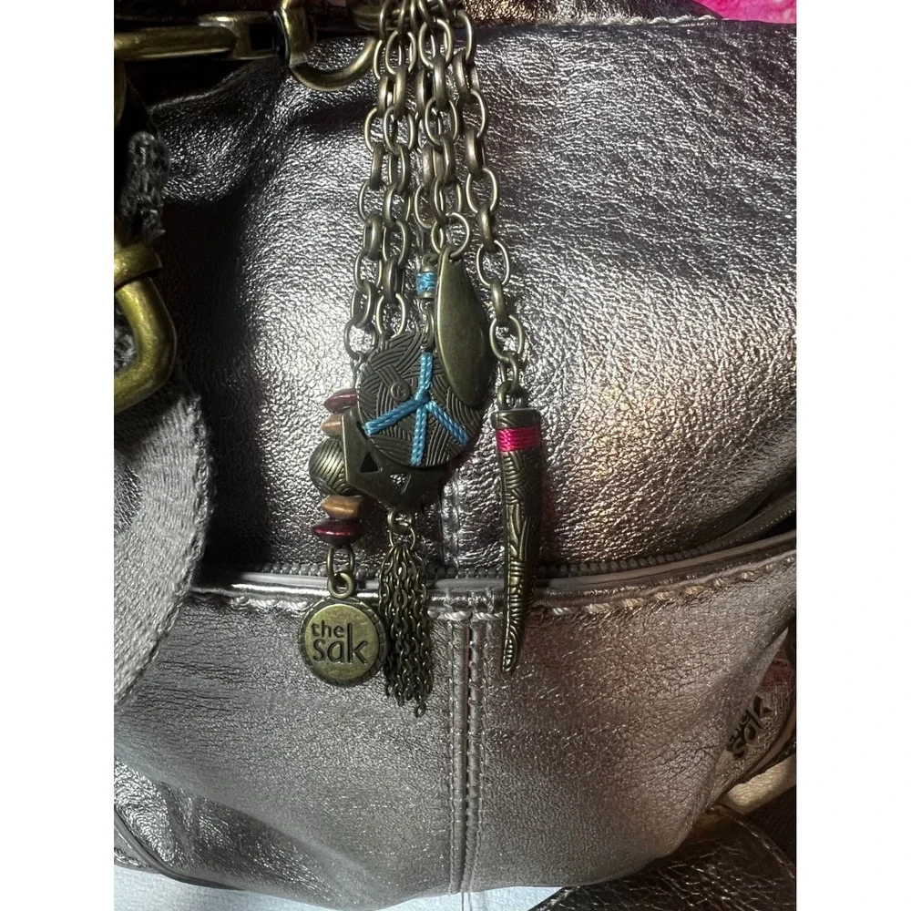 The Sak Metallic Pewter Leather Crossbody Bag Boho Charm Antiqued Brass Hardware